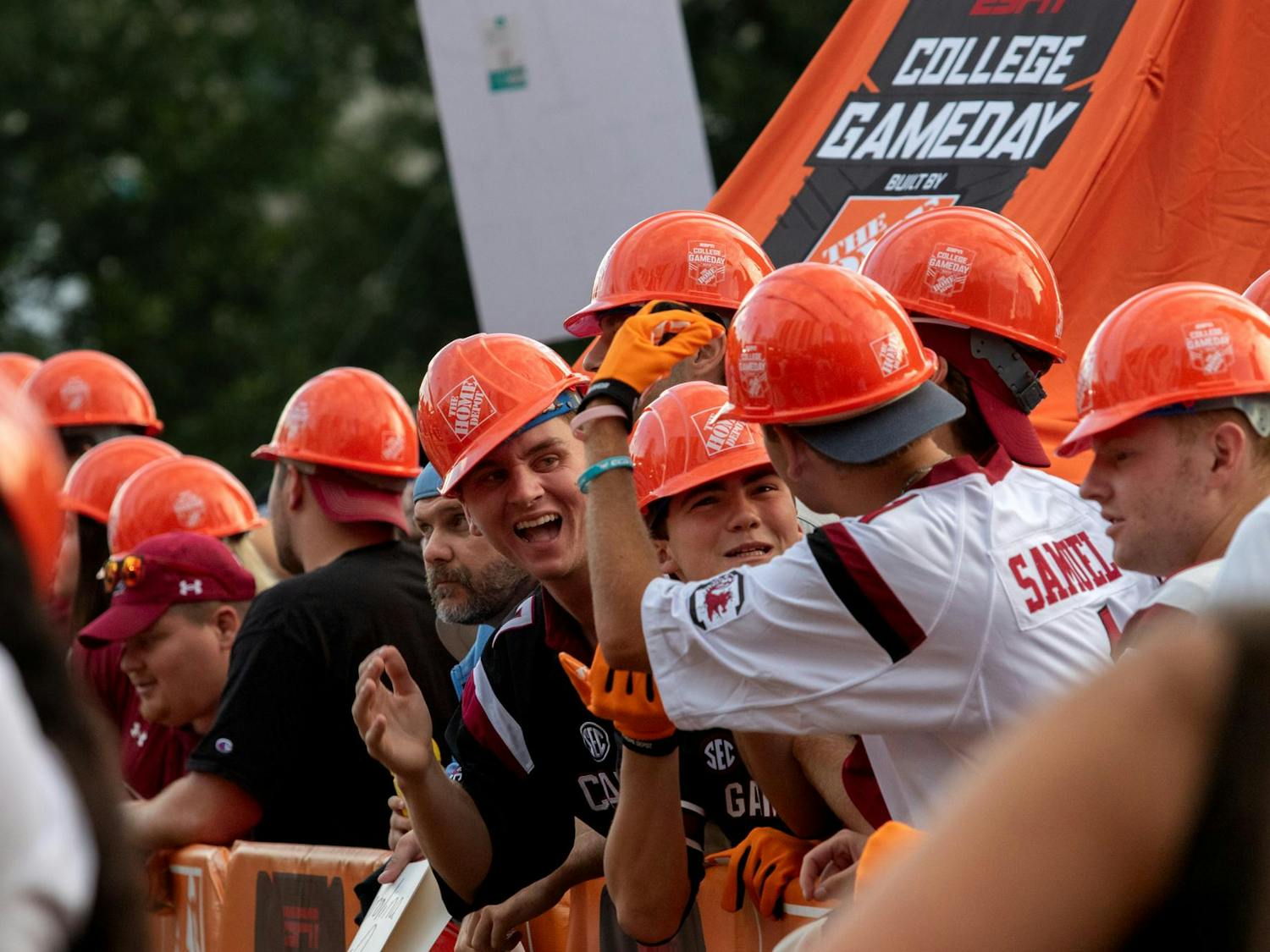 A group of fans in the front row of the College GameDay pit laugh with their friends. College GameDay was in Charlotte, N.C, on Sept. 2, 2023, for the Duke's Mayo Classic.