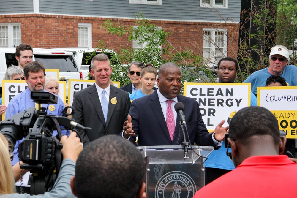 <p>Former Mayor Stephen K. Benjamin speaks to the press after signing a resolution to move the city of Columbia to 100% renewable energy.</p>