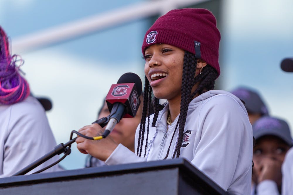 Senior guard Destanni Henderson speaks to fans in Columbia, SC on April 4, 2022. Fans lined the streets outside of Colonial Life Arena to welcome the team back to Columbia following their victory over the University of Connecticut to claim the NCAA national title.