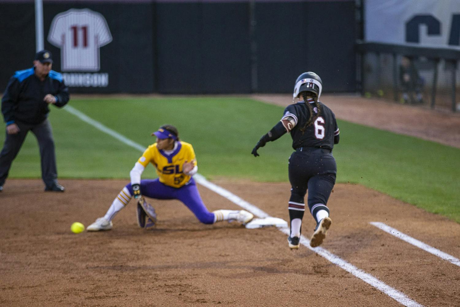 Fifth-year catcher and infielder Jordan Fabian tries to outrun the play to first base during the matchup between South Carolina and LSU at Beckham Field on March 13, 2023. The Tigers beat the Gamecocks 5-1 during the second game of the doubleheader.&nbsp;