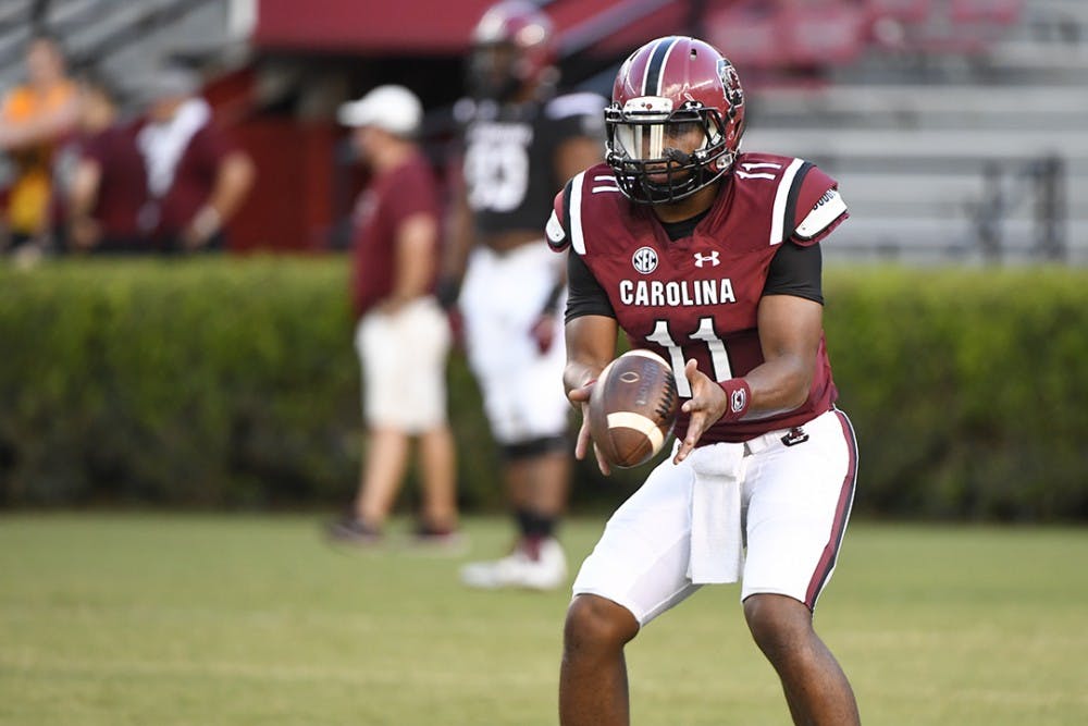  UNCW  THIRD BASEMAN DANIEL STACK SLIDES SAFELY INTO SECOND BASE.