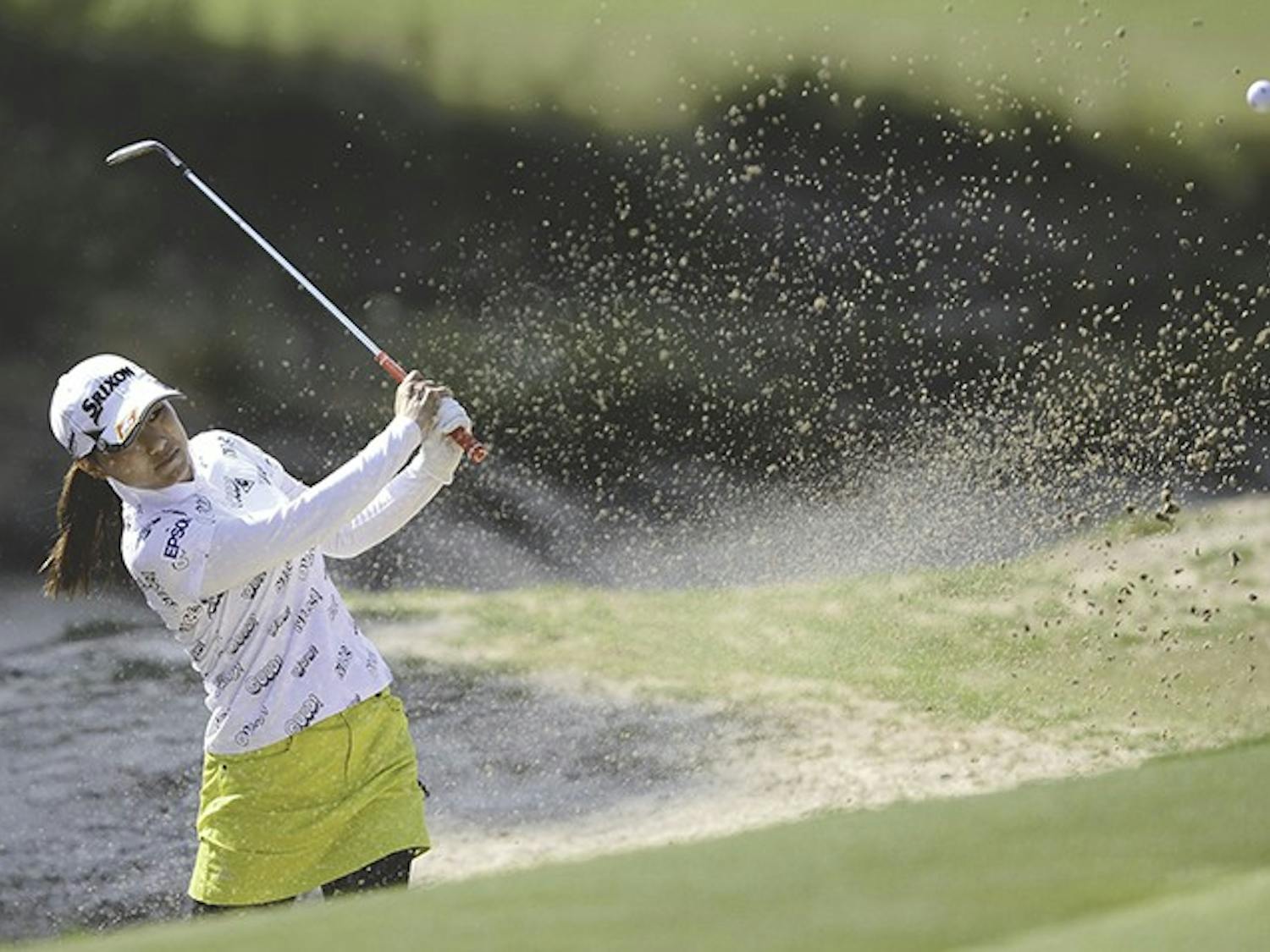 Sakura Yokomine hits out of a sand bunker on the 16th hole during the first day of the 2014 U.S. Women's Open at Pinehurst No. 2 in Pinehurst, N.C., Thursday, June 19, 2014. (Ethan Hyman/Raleigh News & Observer/MCT)