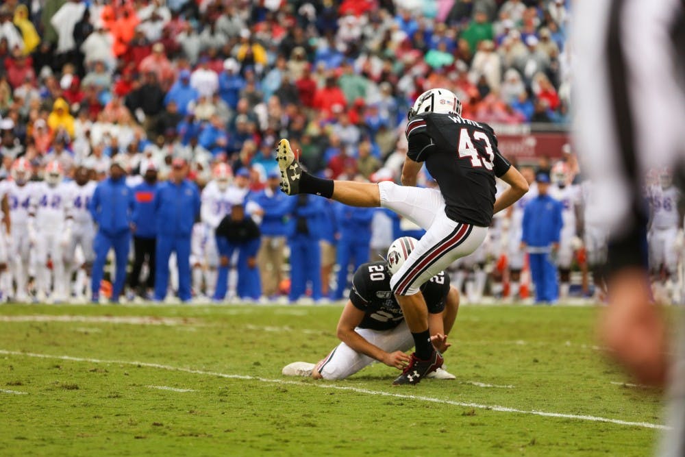 Junior place-kicker Parker White kicks a field goal at Williams-Brice Stadium Saturday.