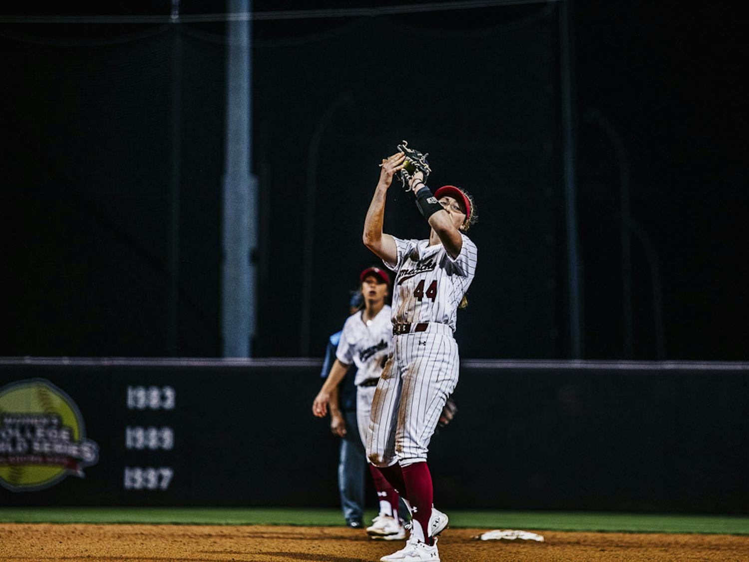 Sophomore infielder Emma Sellers catches a fly ball during the fifth inning of the South Carolina vs. College of Charleston game at Carolina Softball Stadium at Beckham Field on February 15, 2023. The Gamecocks beat the Cougars 8-0.&nbsp;