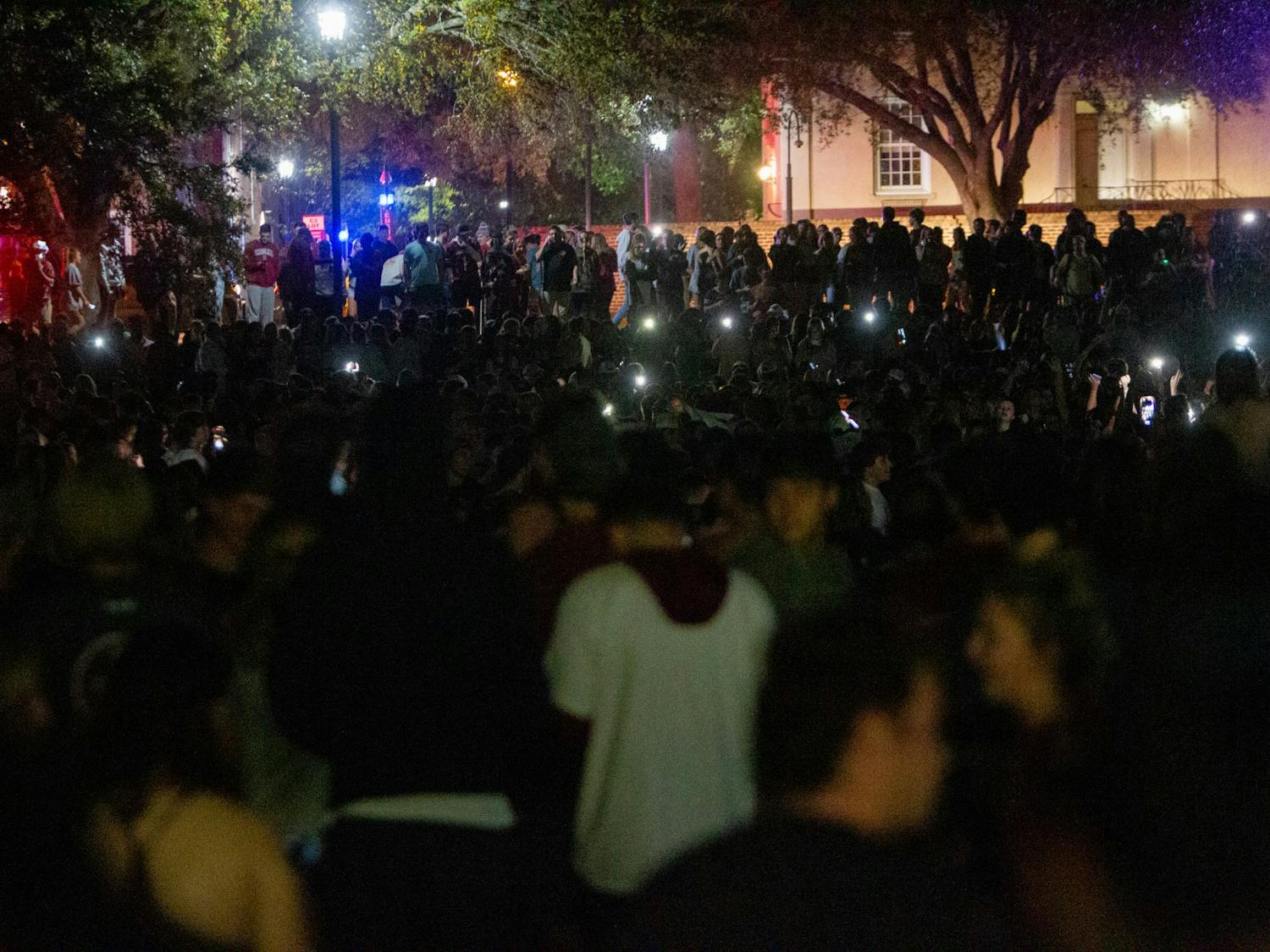 Students at the University of South Carolina storm the fountain at Thomas Cooper Library on April 3, 2022 in Columbia, SC. The celebration came shortly after the women's basketball team defeated UConn in the NCAA championship.&nbsp;