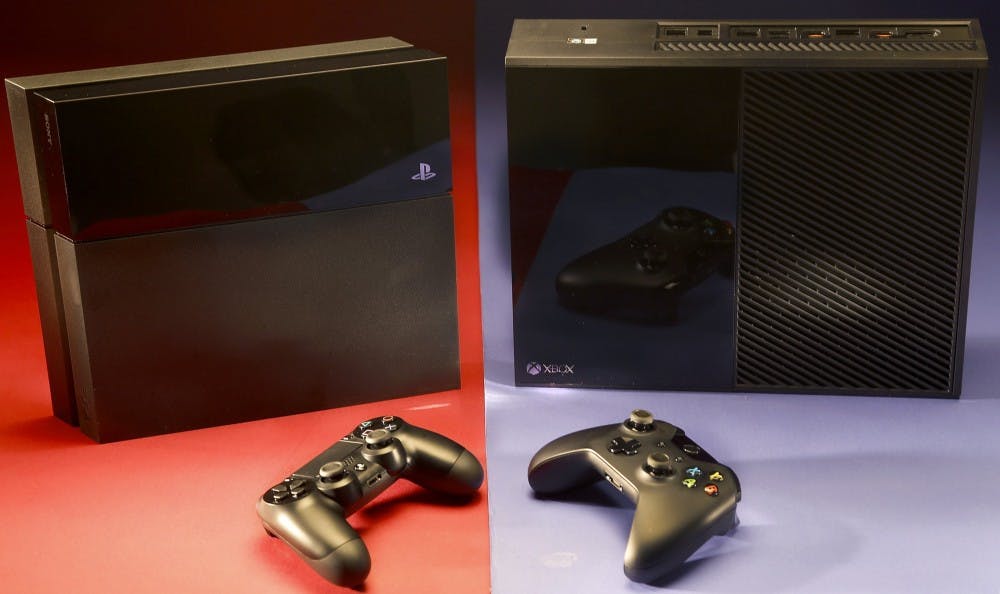 Sony's Playstation 4, left, and Microsoft's XBox One square off for the home video game market this holiday season. (Kirk McKoy/Los Angeles Times/MCT)