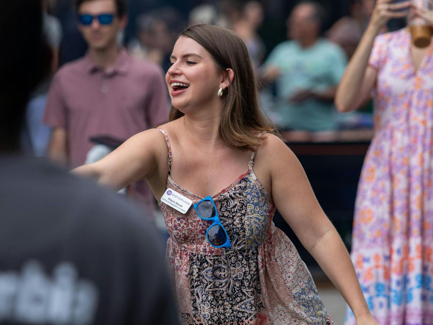 Kalynn Benoit, community engagement coordinator for Sistercare, throws a ball at the dunking booth on July 27, 2024. Sistercare employees and others had an opportunity to dunk Columbia figures to raise money for domestic violence prevention.