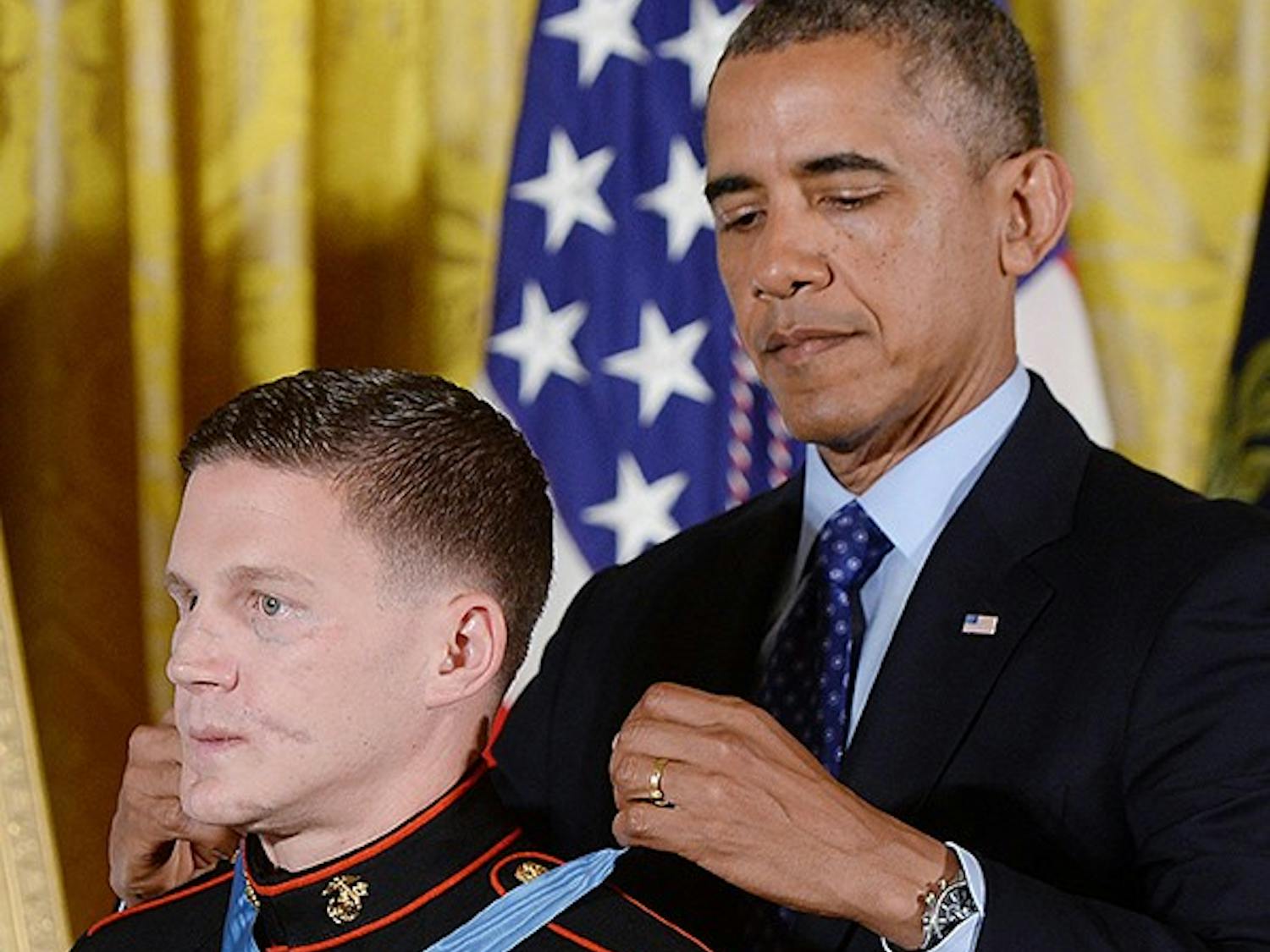 U.S. Marine Corps Cpl. William "Kyle" Carpenter is awardedthe Medal of Honor by President Barack Obama on Thursday, June 19, 2014, at the White House in Washington, D.C. (Olivier Douliery/Abaca Press/MCT)