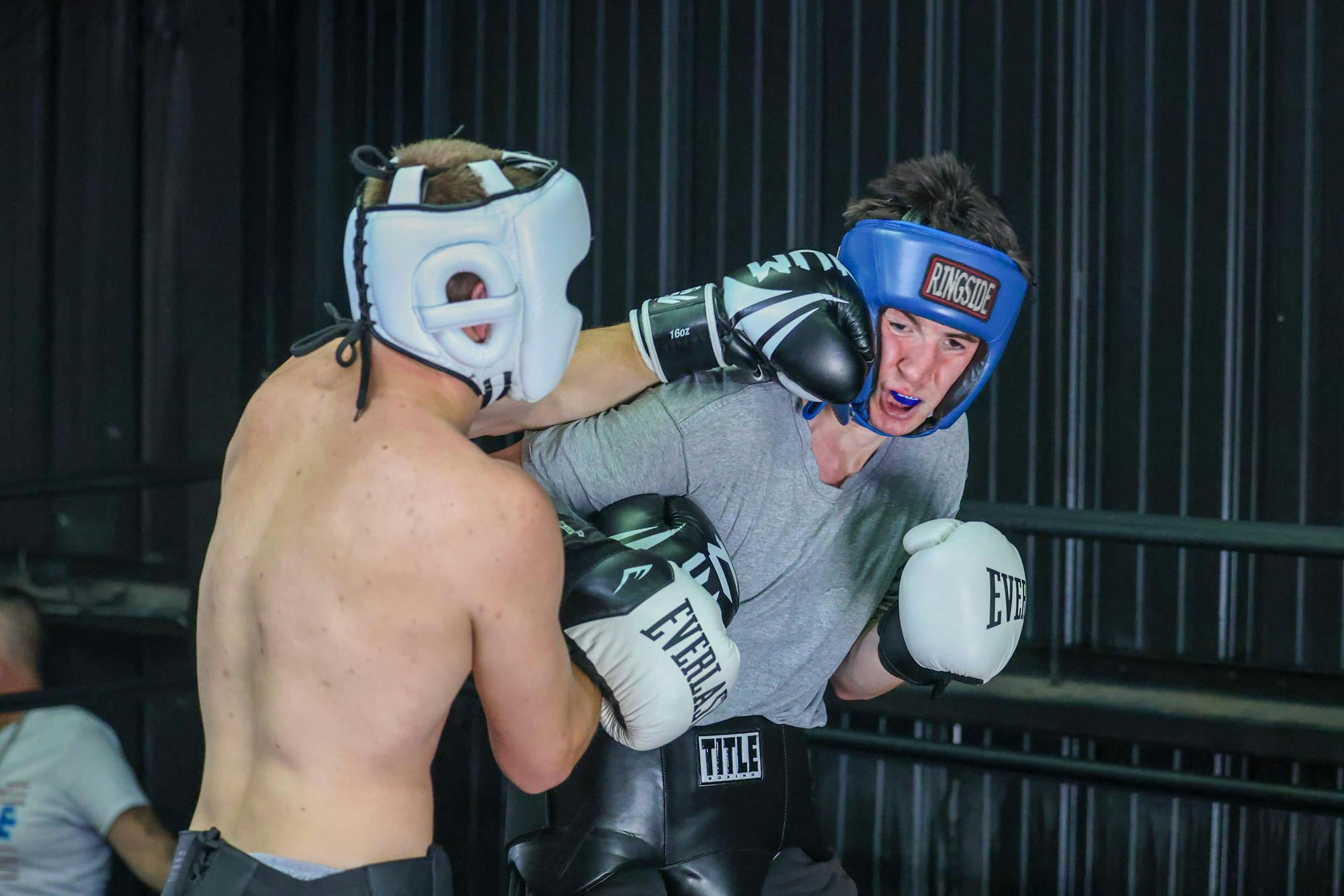 First-year mechanical engineering student Noah Webber lands a punch against his opponent second-year language and international business student Luke McCarthy during a matchup against Clemson University on April 11, 2026. McCarthy defeated Webber in the three-round bout.