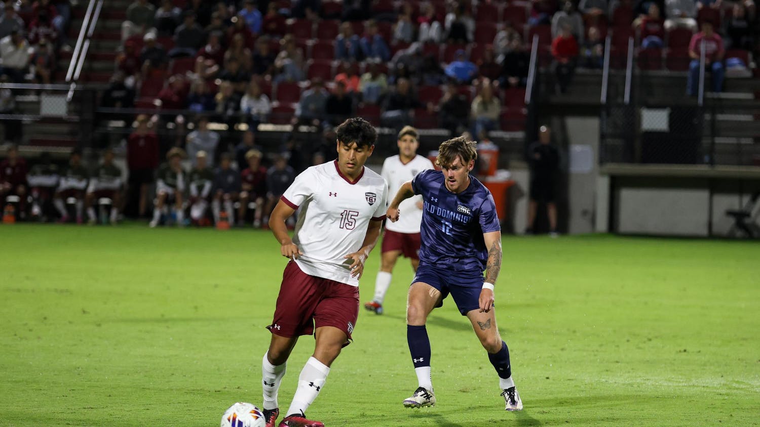 Sophomore midfielder Alejandro Velazquez-Lopez passes the ball while guarding against an opposing player during the game against Old Dominion University on Oct. 10, 2025, at Stone Stadium. Velazquez-Lopez made one shot on the goal out of his two shots overall.