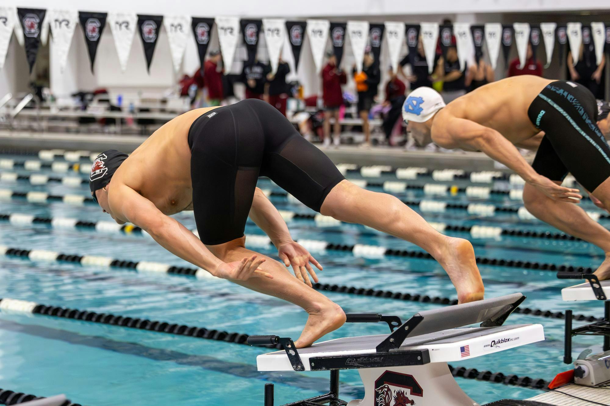 Sophomore freestyle swimmer Anthony Whittall dives into the water to start the men’s 200-yard freestyle event against North Carolina on Nov. 7, 2025, at the Carolina Natatorium. Whittall finished in eighth place with a time of one minute, 40.38 seconds.