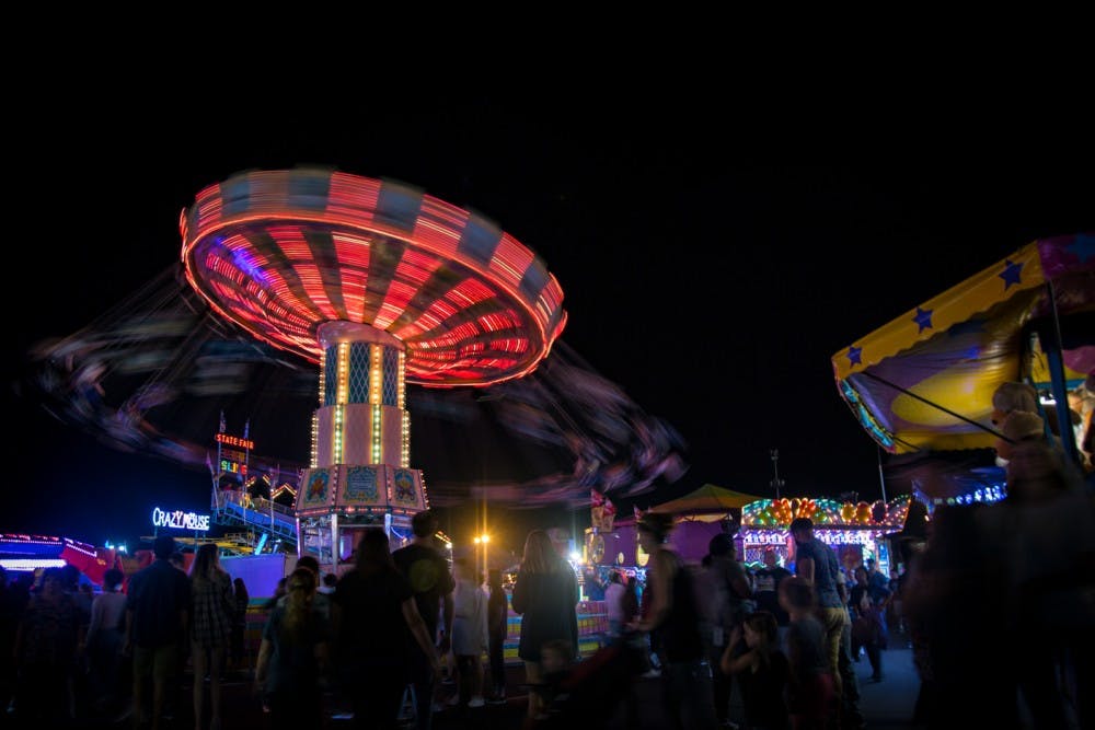 A long exposure of chair swing ride at the state fair.