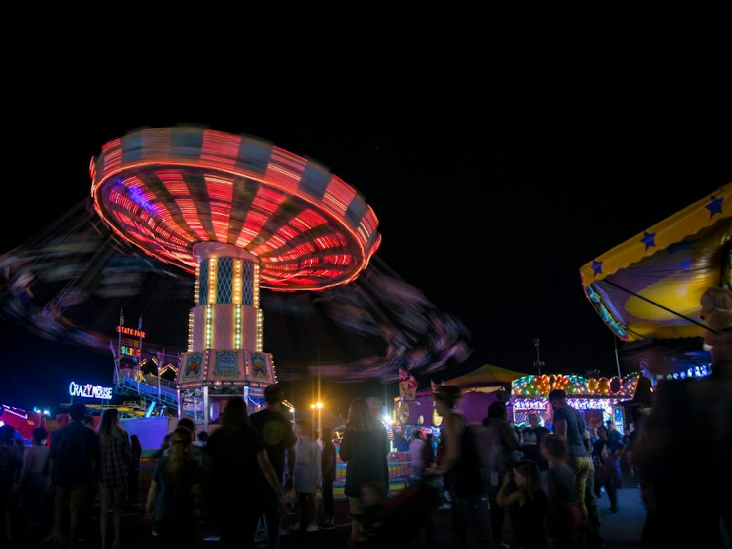 A long exposure of chair swing ride at the state fair.