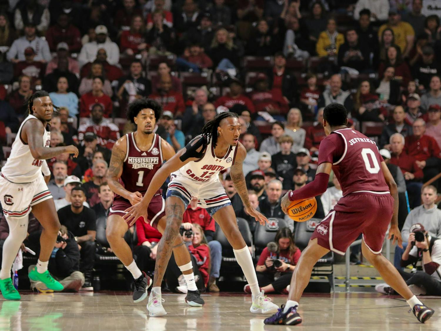 Sophomore guard Zachary Davis watches the ball as he plays defense on Jan 6, 2024. Davis finished the game with 9 points, aiding the 68-62 win against Mississippi State. The Gamecocks are now 13-1 for the sixth time in school history.