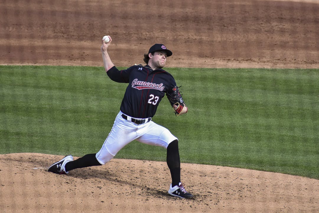 Junior right-handed pitcher Jack Mahoney pitches the ball to UMass Lowell during the game on Feb. 19, 2023. In 2021, Mahoney was awarded the Perfect Game Freshman All-America second team.