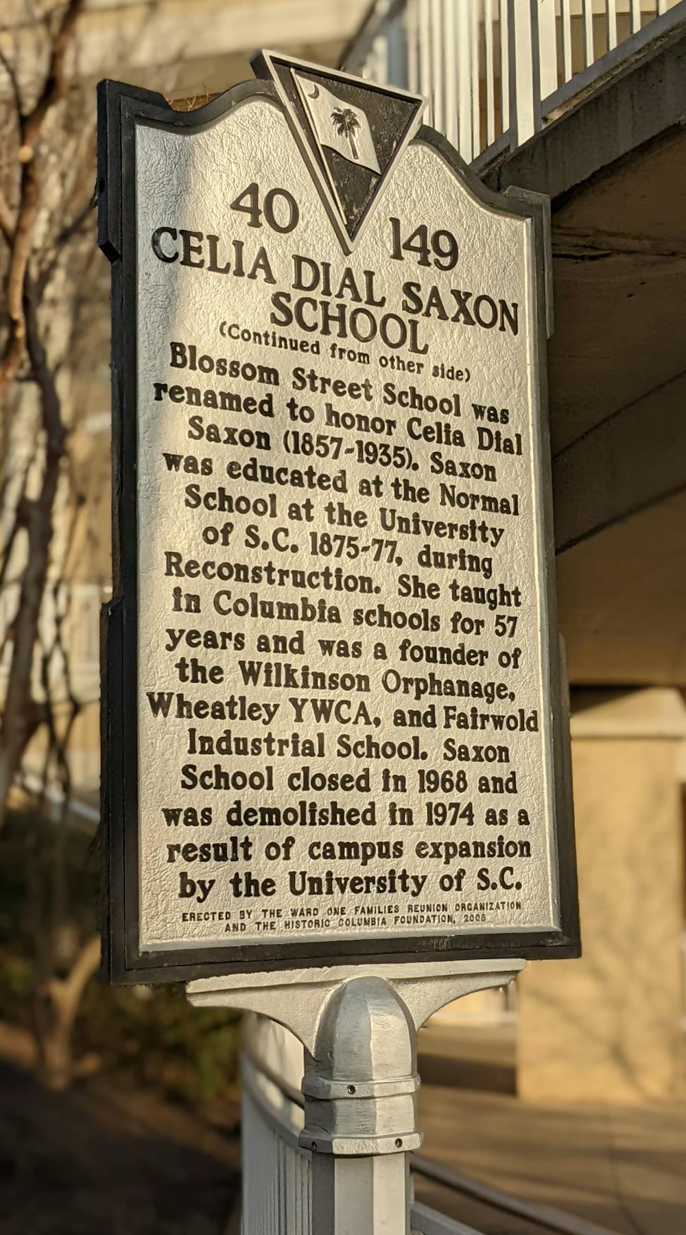 A historical marker recognizing Celia Dial Saxon outside of the Strom Thurmond Wellness and Fitness Center in Columbia, SC, which is located on the former site of an elementary school named after Saxon.