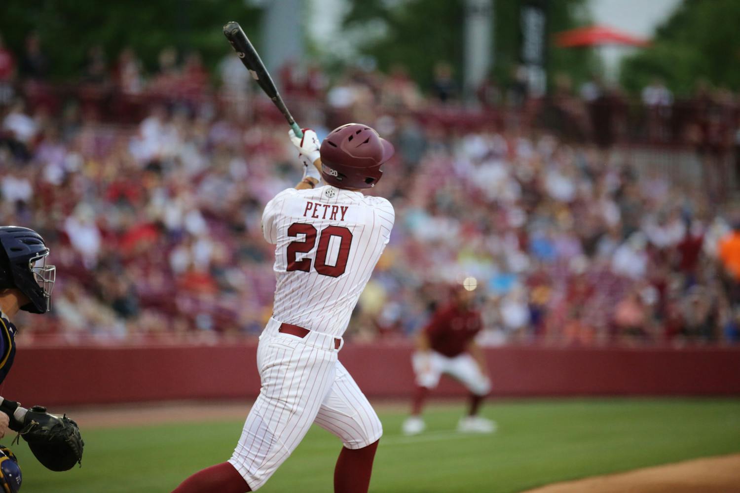 Freshman outfielder Ethan Petry hits a home run in his first at-bat of the game against LSU on April 6, 2023. This was the first of 13 runs for the Gamecocks in the series opener at Founders Park.
