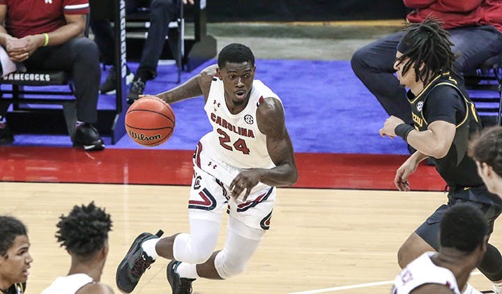 Junior forward Keyshawn Bryant dribbles the ball in the game against Missouri. South Carolina lost, 93-78.