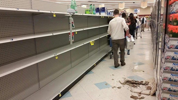 Rite Aid on Rosewood Drive has sold out of water. Wet ceiling tiles have fallen. 