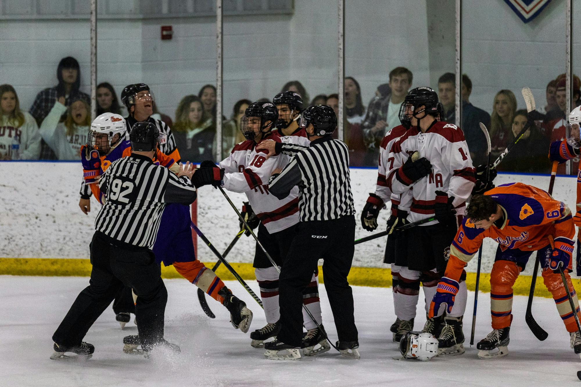 Senior winger Chad Lizine is pulled away from a Clemson opponent during a hockey match on Nov. 11, 2022. The brief scuffle is stopped early on by officials as the competition between the two South Carolina rivals heats up.