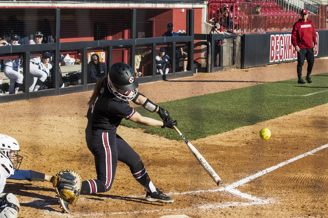Sophomore infielder Brooke Blankenship swings for the ball during the match against George Washington University at Beckham Field on Feb. 18, 2023. The Gamecocks went on to win the game 7-1. 