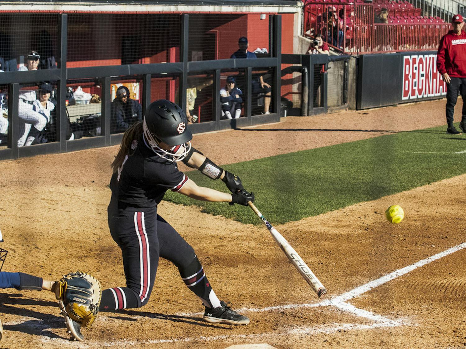 Sophomore infielder Brooke Blankenship swings for the ball during the match against George Washington University at Beckham Field on Feb. 18, 2023. The Gamecocks went on to win the game 7-1. 