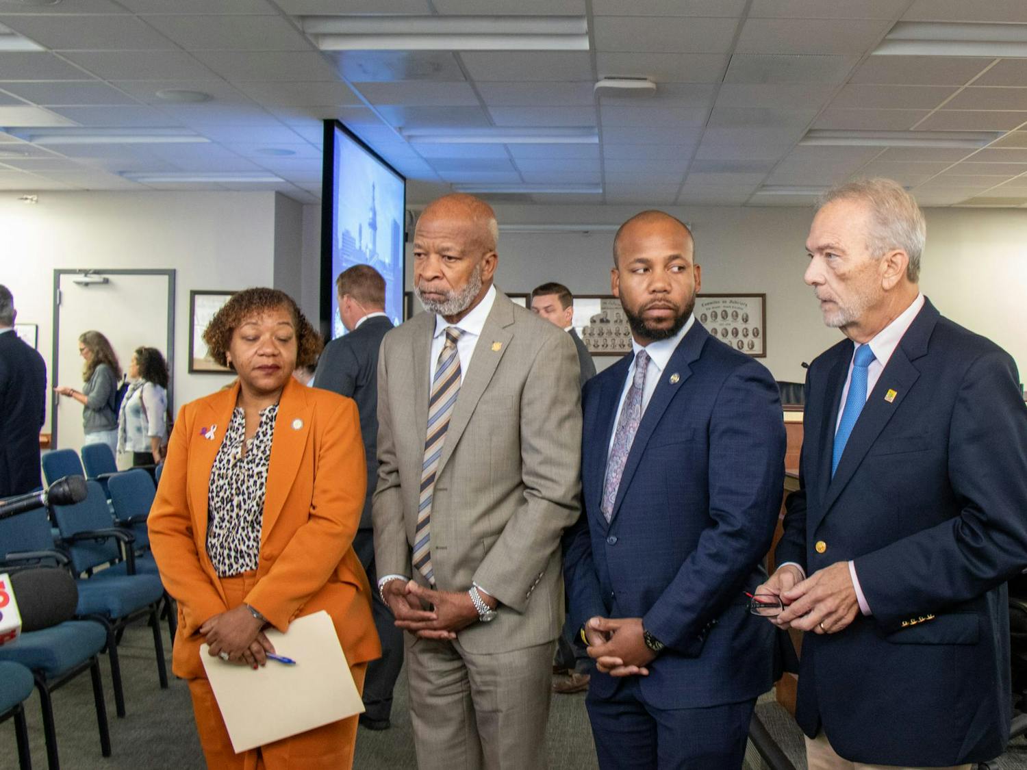 A group of state senators stand in line together during a public hearing on S.B. 323 at Gressette Building on Oct. 1, 2025. The bill was heard by the Senate Medical Affairs Committee's subcommittee.