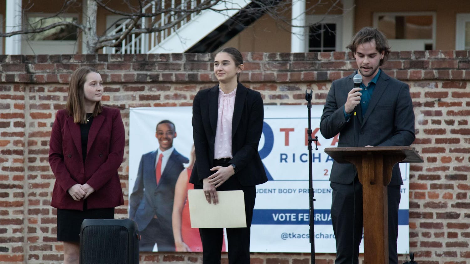 Members of the University of South Carolina elections committee and election participants stand on a stage as they await the results from the most recent election on Feb. 26, 2025. Due to the impending court hearings, only the student body treasurer and speaker of the senate were revealed.