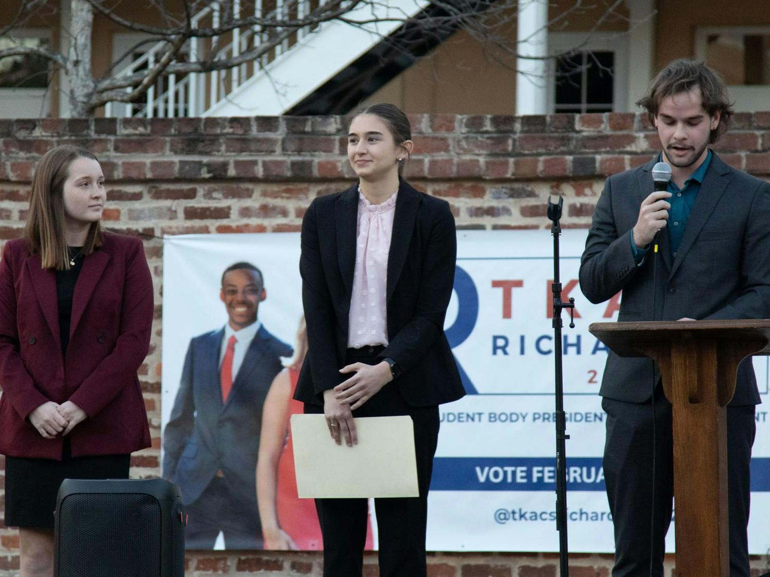 Members of the University of South Carolina elections committee and election participants stand on a stage as they await the results from the most recent election on Feb. 26, 2025. Due to the impending court hearings, only the student body treasurer and speaker of the senate were revealed.
