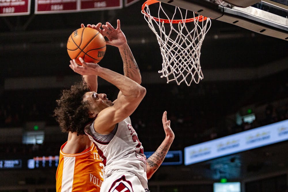 <p>Freshman guard Devin Carter goes up for a shot in an NCAA basketball game on Feb. 5, 2022 at Colonial Life Arena in Columbia, SC. The Gamecocks lost to Tennessee 81-57.&nbsp;</p>
