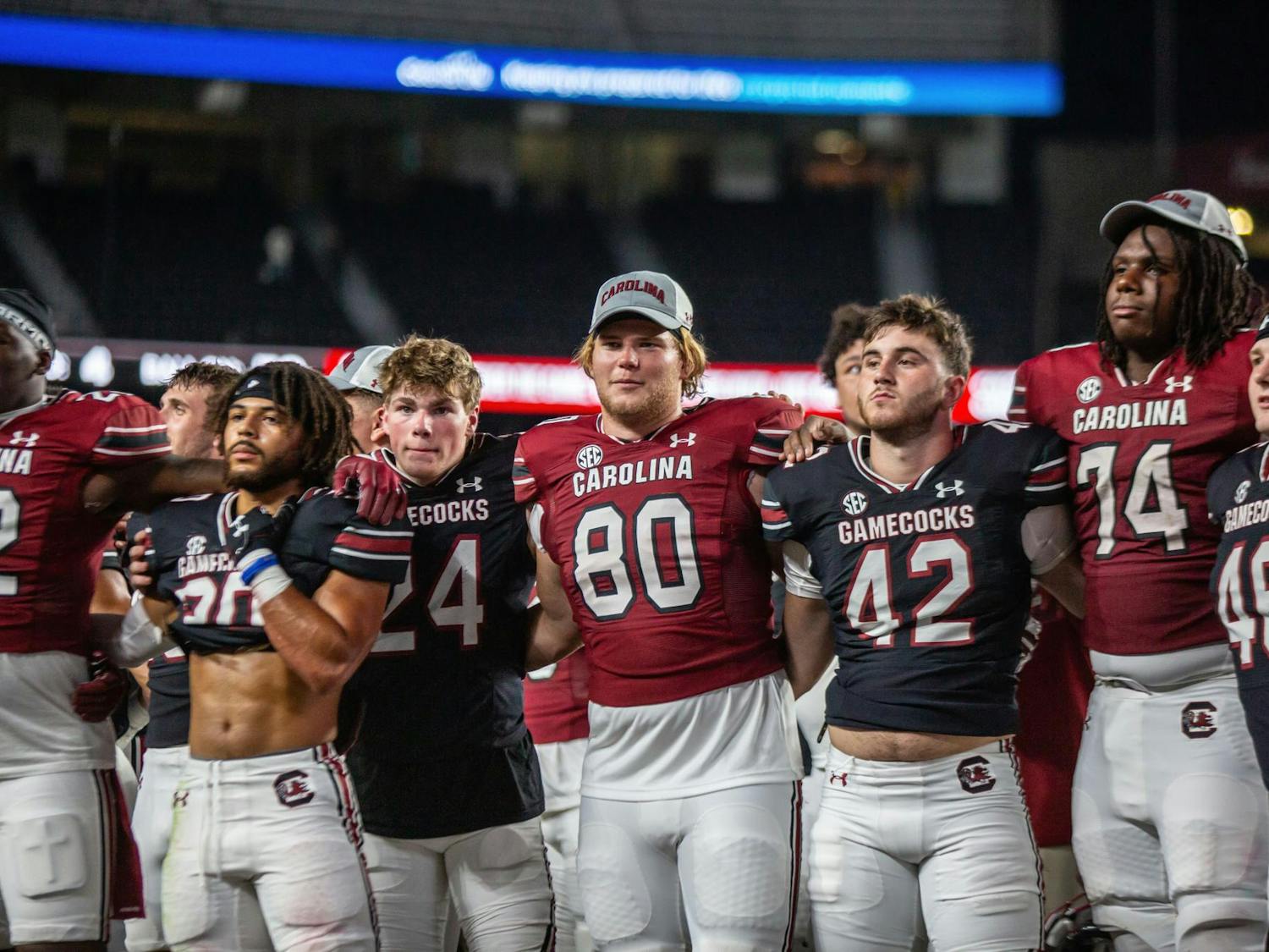 Members of the South Carolina football team gather in front of the Carolina Band for the alma mater following the 2024 Garnet & Black Spring Game at Williams-Brice Stadium on April 20. The Garnet team defeated the Black team 17-0.