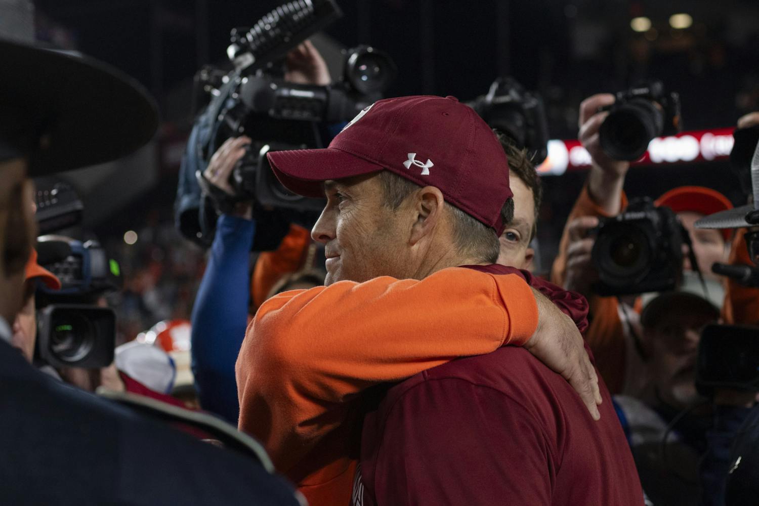 Clemson University head coach Dabo Swinney hugs University of South Carolina head coach Shane Beamer after a 16-7 Tiger victory over the Gamecocks at Williams-Brice Stadium on Nov. 25, 2023. The 121st Palmetto Bowl will return to Clemson in 2024.