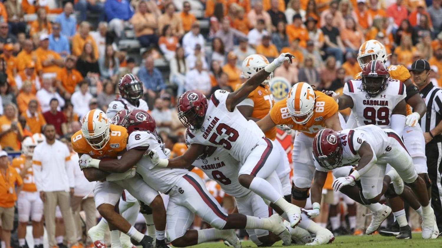 &nbsp;University of South Carolina football player tackles a University of Tennessee player Oct. 26, 2019. South Carolina lost 41-21.&nbsp;