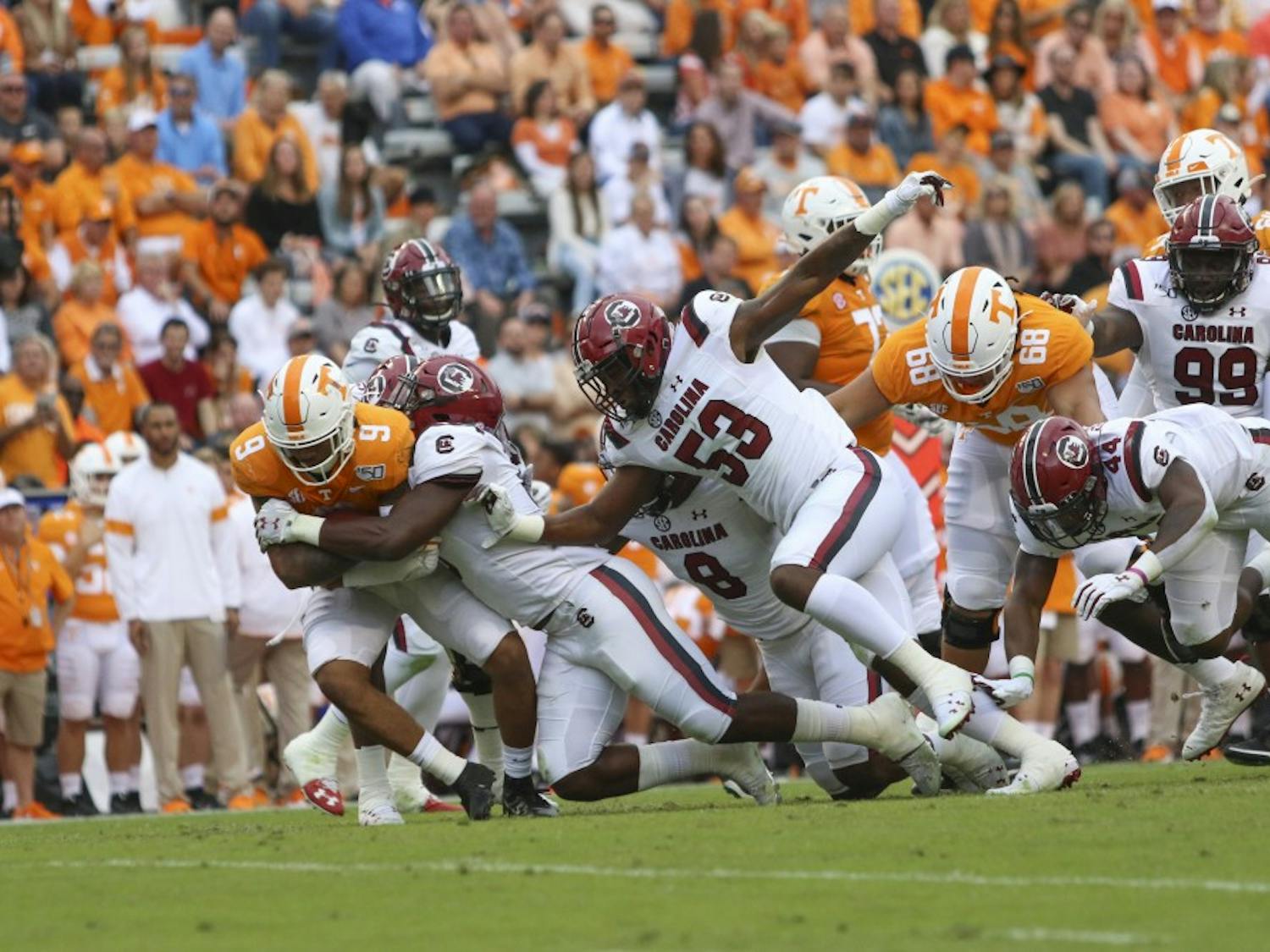  University of South Carolina football player tackles a University of Tennessee player Oct. 26, 2019. South Carolina lost 41-21. 