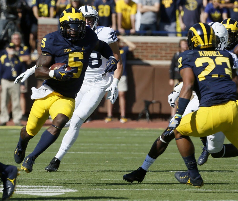 Michigan&apos;s Jabrill Peppers (5) returns a punt during first-half action against Penn State at Michigan Stadium in Ann Arbor, Mich., on Saturday, Sept. 24, 2016. Michigan won, 49-10. (Eric Seals/Detroit Free Press/TNS)