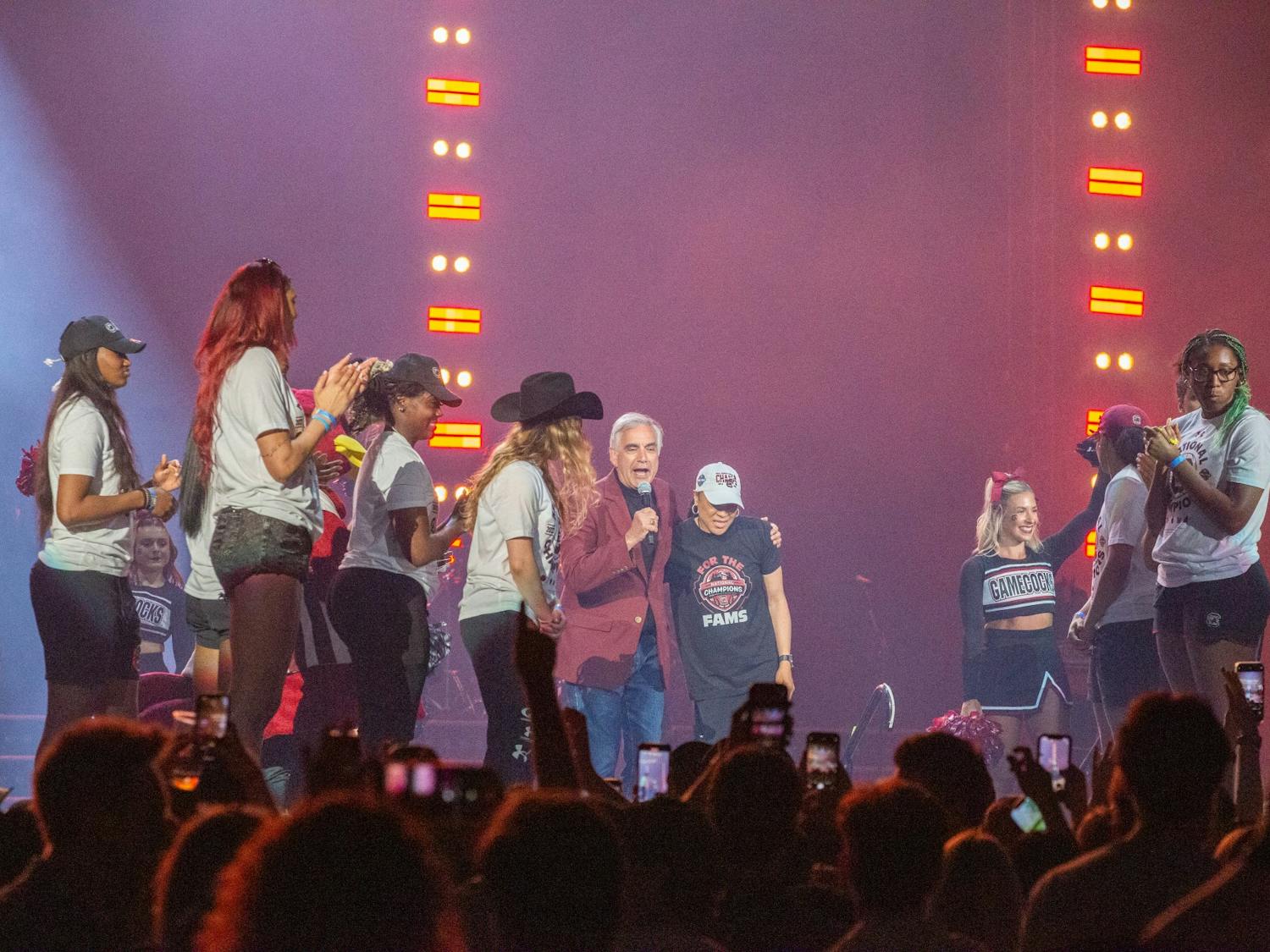 University of South Carolina interim President Harris Pastides congratulates South Carolina women’s basketball head coach Dawn Staley at the Darius Rucker concert at Colonia Life Arena on April 24th, 2022. The concert was held as a celebration for the women's basketball team.
