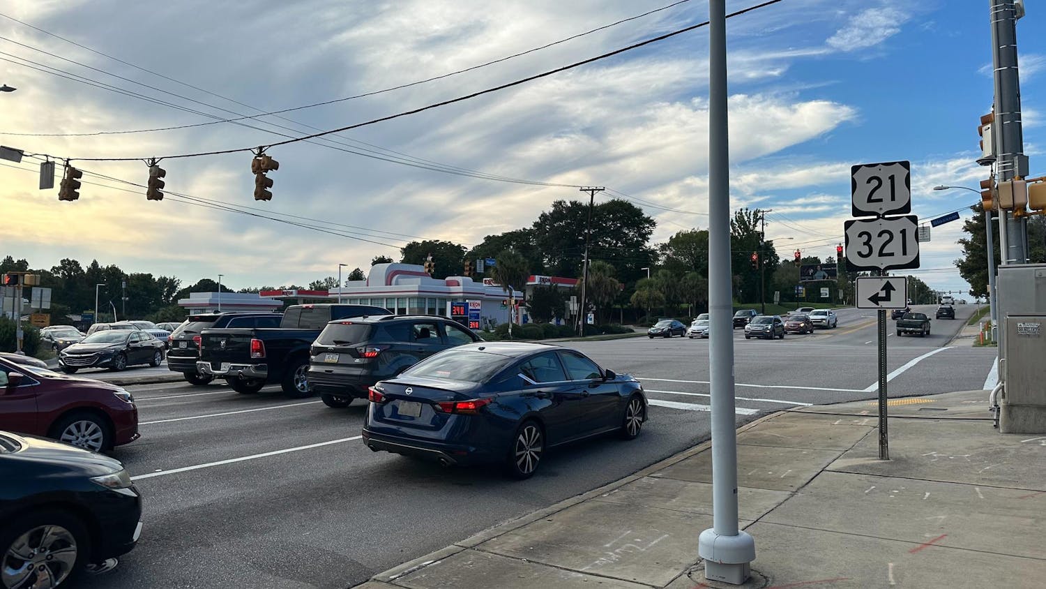 A picture of cars stopped at the corner of Huger and Blossom Street. Traffic was stopped briefly Tuesday evening after the Columbia Fire and Police Department responded to an emergency situation by the Blossom Street bridge. 