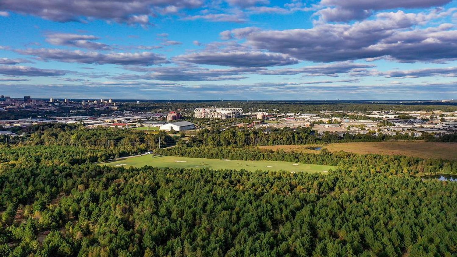 An aerial shot of the land being used in the upcoming 'Stadium Project' on Oct. 17, 2023. The University of South Carolina plans on renovating 800 acres of land next to the stadium, building luxury suites, shopping areas, and using 300 acres of the land to build recreational fields for many of the club sport teams on campus.