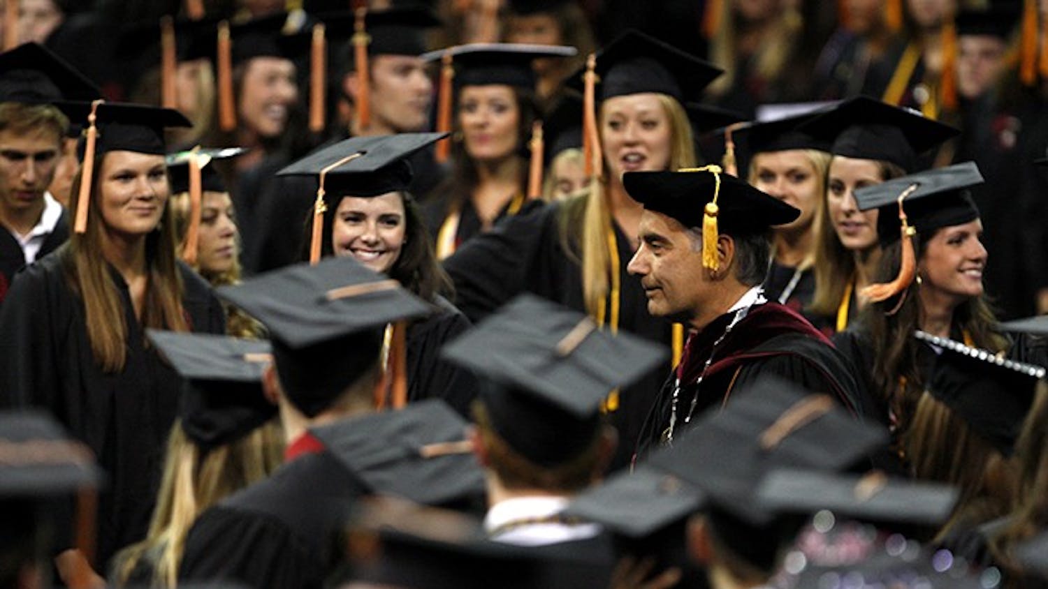 University of South Carolina president Harris Pastides heads to the stage during the school's commencement ceremony in Columbia, South Carolina, on Friday, May 10, 2013. (Gerry Melendez/The State/MCT)