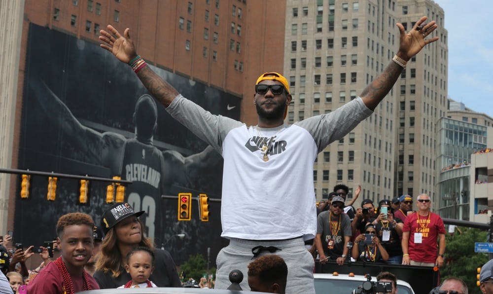 The Cleveland Cavaliers' LeBron James along Huron Road in Cleveland during the team's NBA Championship celebration on June 22, 2016. James and his business partner Maverick Carter are behind new reality TV series, "Cleveland Hustles."(Phil Masturzo/Akron Beacon Journal/TNS)