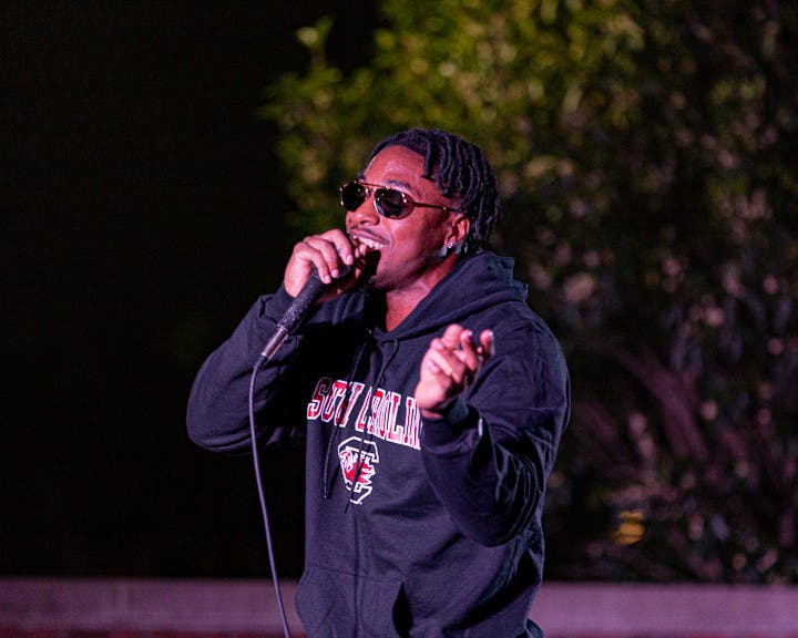 Fourth-year sports and entertainment management student Joshua Jordan, known as The Gamecock Rapper, raps to the crowd during his performance at the Battle of the Bands on Oct. 5, 2022. &nbsp;The competition brought acappella, folk, rap and rock to the Russel House Patio in a variety of performances.&nbsp;