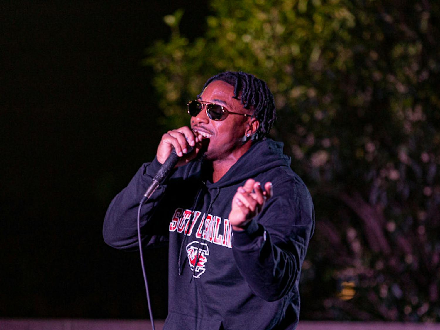 Fourth-year sports and entertainment management student Joshua Jordan, known as The Gamecock Rapper, raps to the crowd during his performance at the Battle of the Bands on Oct. 5, 2022. &nbsp;The competition brought acappella, folk, rap and rock to the Russel House Patio in a variety of performances.&nbsp;