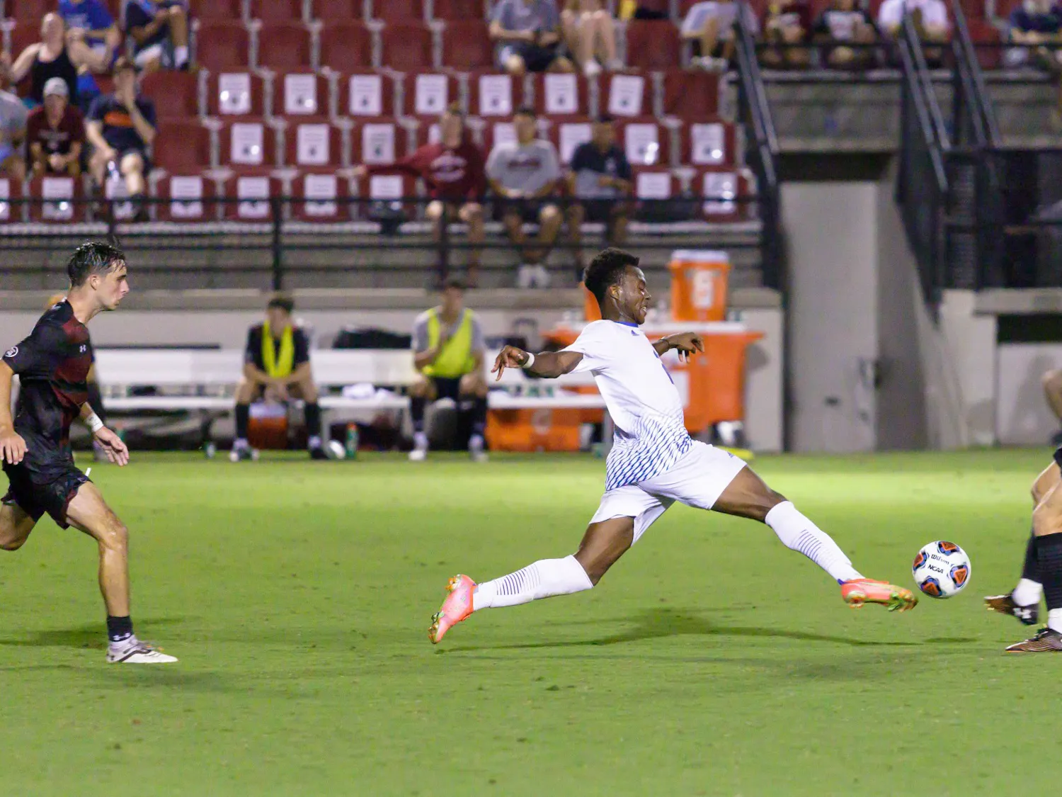Presbyterian Sophmore Daniel Anani (forward) kicks the ball.