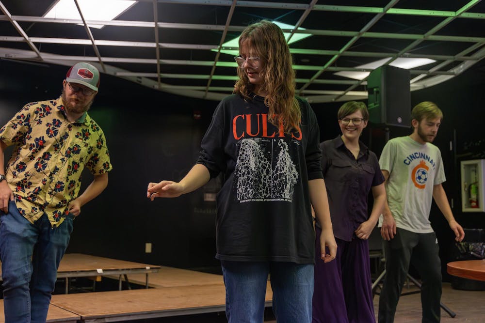 <p>Lauren Hansborough, the vice president of the Gamecock Swing Dance Club and a fourth-year visual communications student, leads other club members in learning a new dance during the club's meeting on Nov. 15, 2024. The club is open to all students and offers a weekly swing jazz dance class for dancers of all levels.</p>