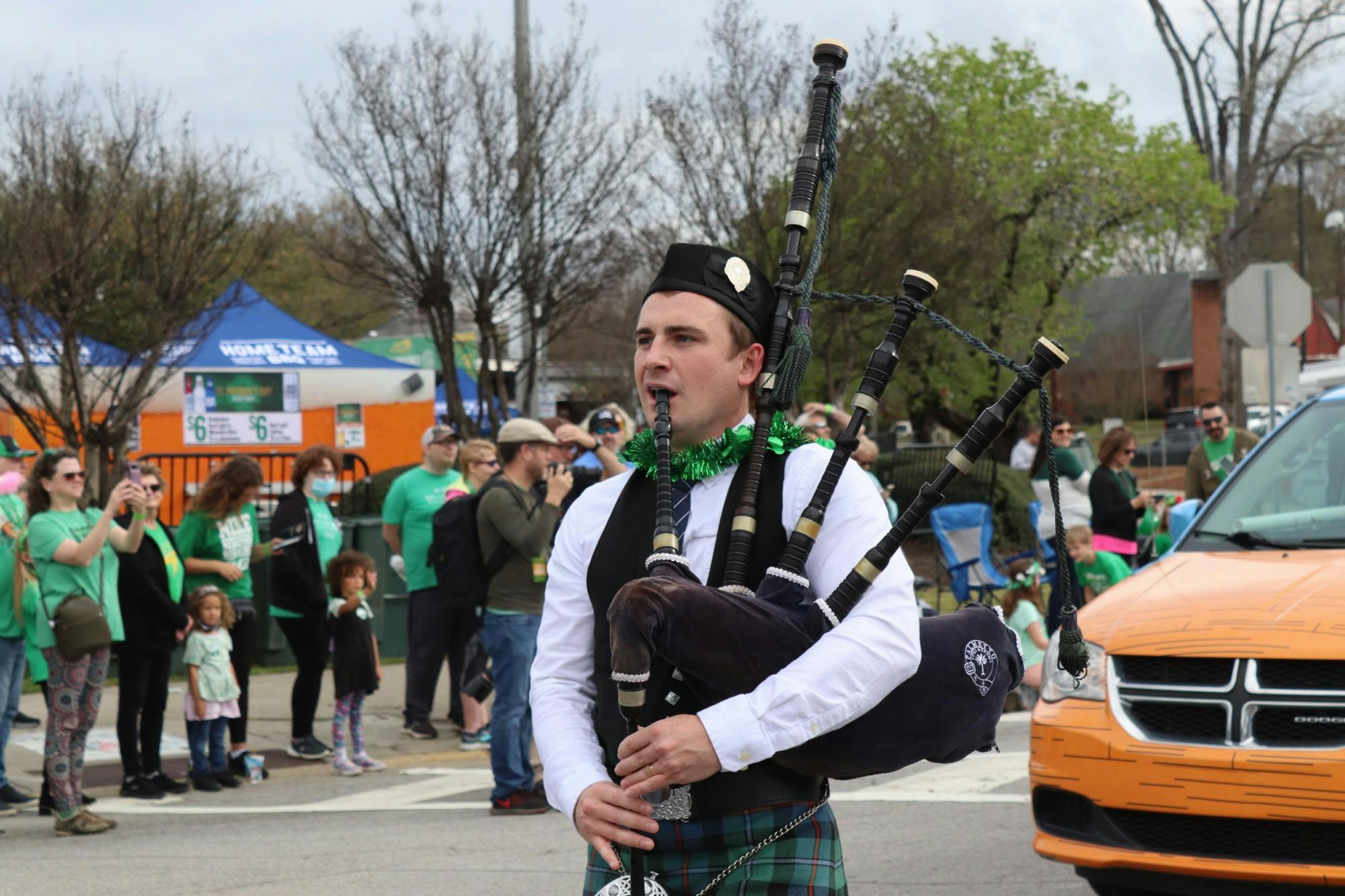 A bagpiper plays the bagpipes in the 40th Annual St. Pats in 5 Points Parade on March 19, 2022.