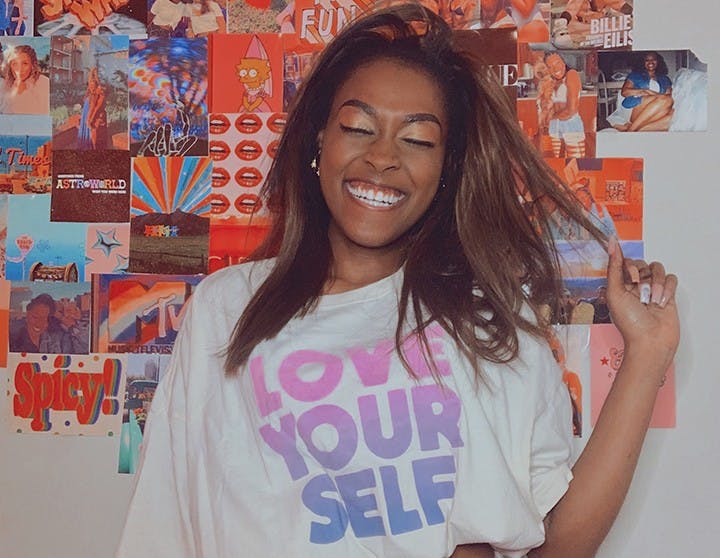 Amber Lipscomb, a campus ambassador, modeling the one size tee from PINK.