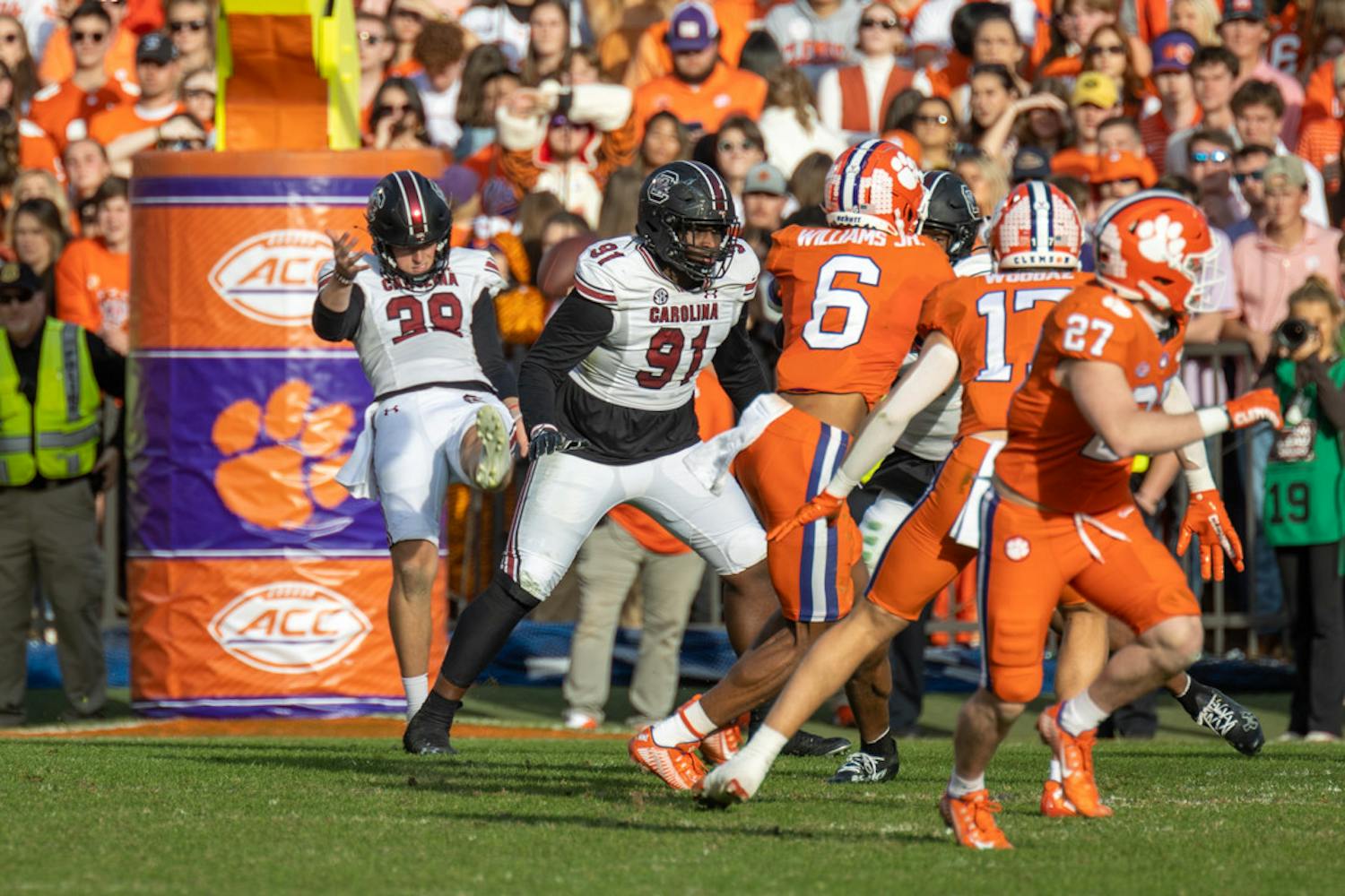 Junior punter Kai Kroeger punts away the ball after a stalled drive on Nov. 26, 2022, at Memorial Stadium. Kroeger punted for a total of 376 yards agains Clemson.