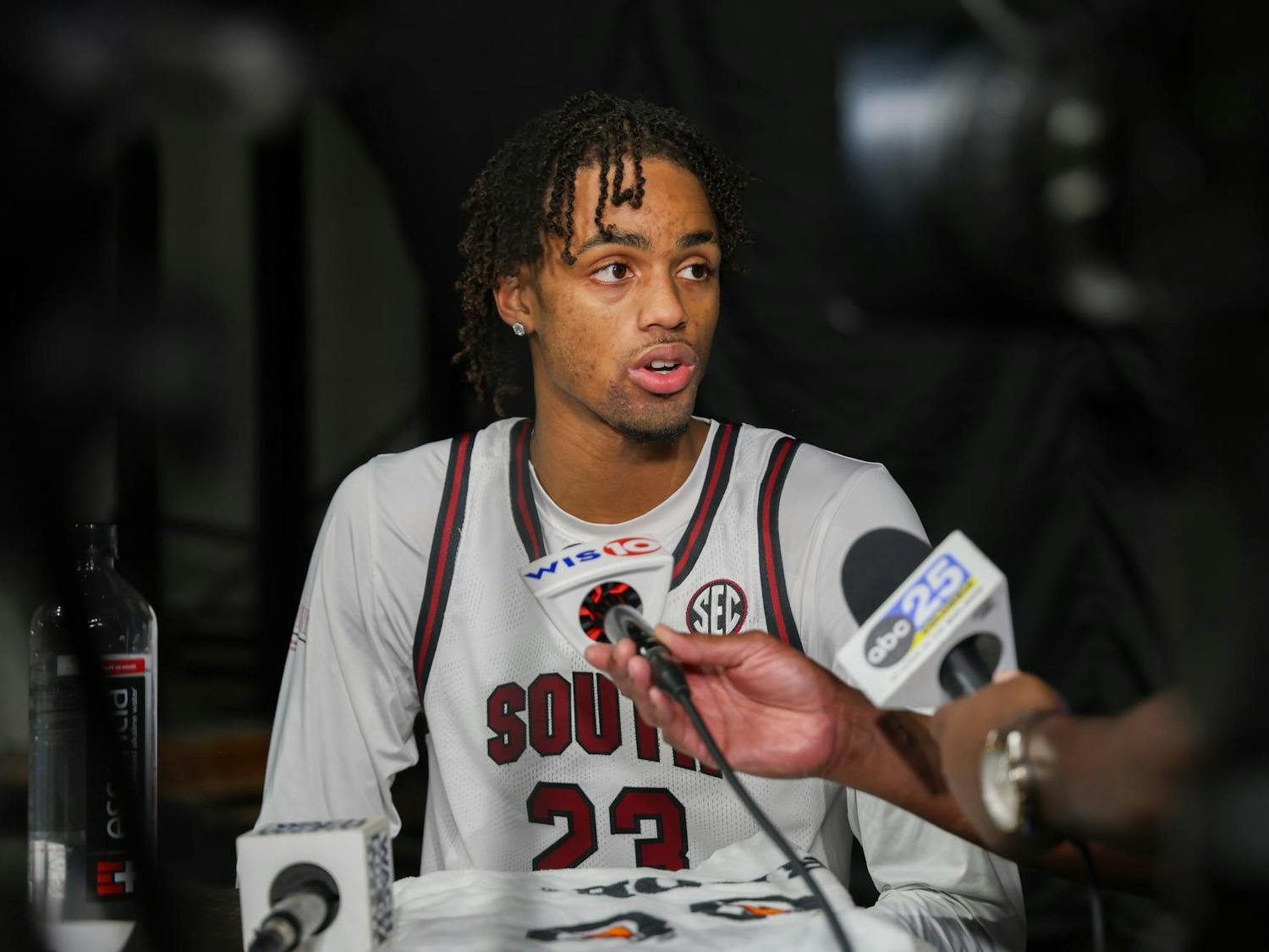 FILE – Freshman guard Cam Scott talks to reporters after a team practice on Oct. 21, 2024 at Colonial Life Arena. Scott, the top player in South Carolina in his recruiting class, averaged 22 points and 6.4 rebounds per game in his senior year of high school.