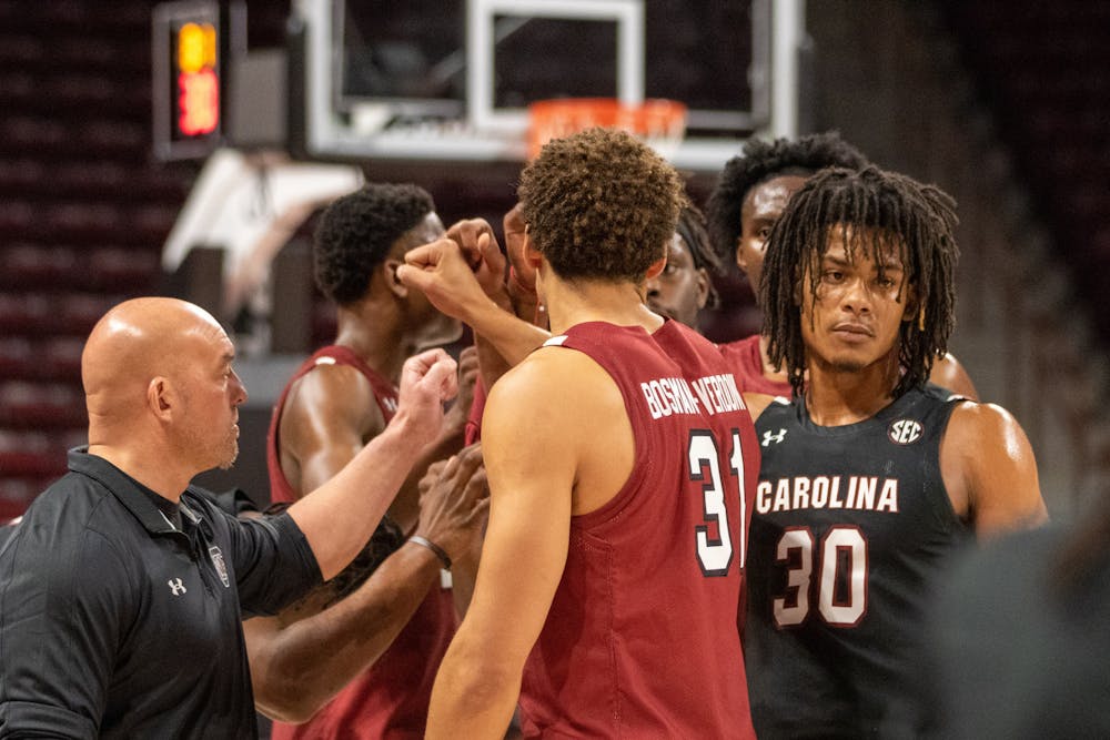 <p>The Gamecocks huddle up before an intrasquad scrimmage on Oct. 26, 2022. The men's basketball team hosted the Garnet &amp; Black Madness event to prepare for the upcoming season.</p>