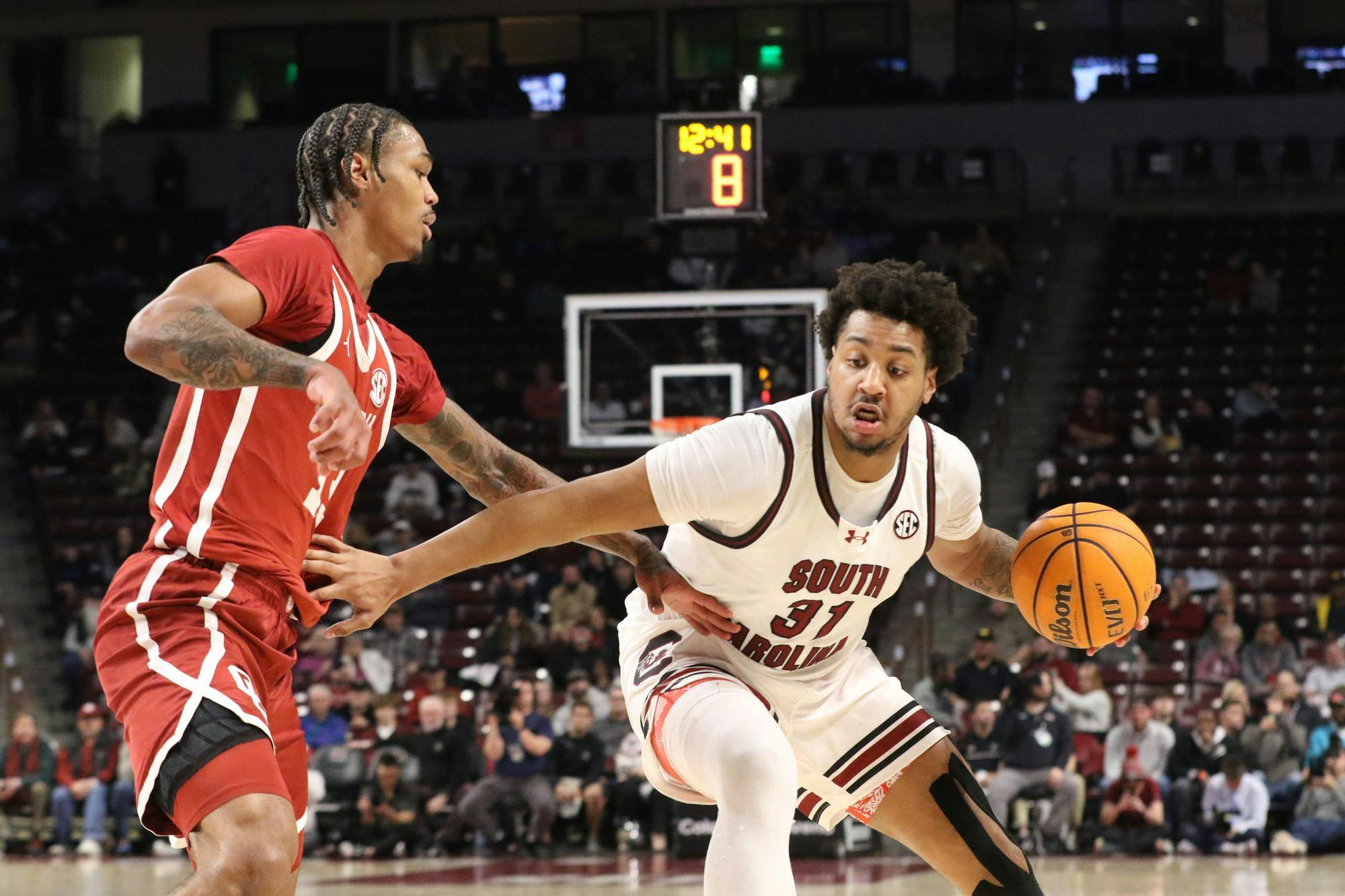 South Carolina junior forward Elijah Strong protects the ball as he runs down the court in the Gamecocks' matchup against the Sooners on Jan. 20, 2026 at Colonial Life Arena. Strong played in the game for a total of 28 minutes, reaching a new season high.